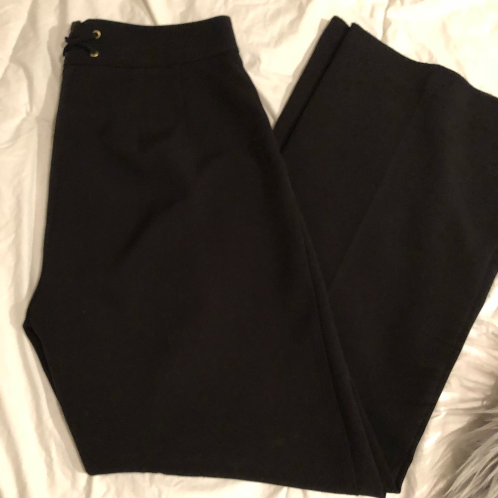 High-waisted black trousers